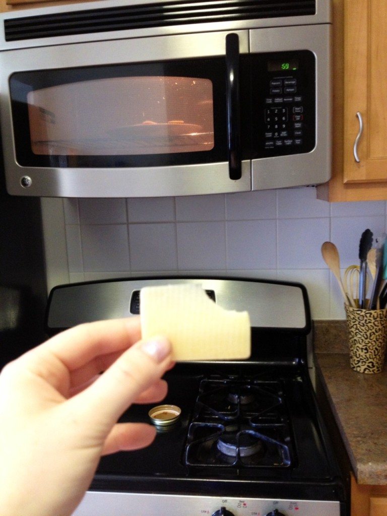 Enjoy a piece of cheese while waiting for the pizzas to heat up :)